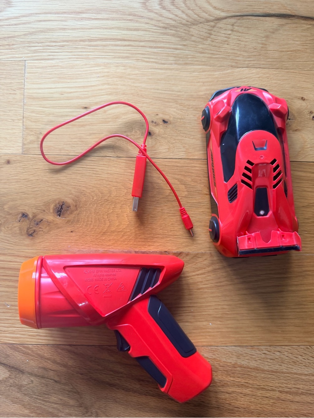 Air Hogs Zero Gravity Light Wall Racer, Red Toy (Functions)